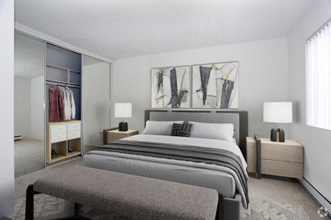 a bedroom with a bed and a closet at The Villas at Monarch Beach, Dana Point, CA